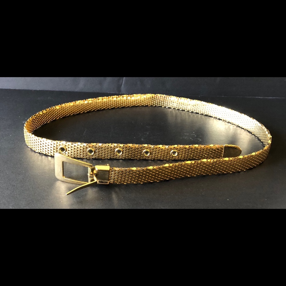 Retro gold-tone skinny belt.